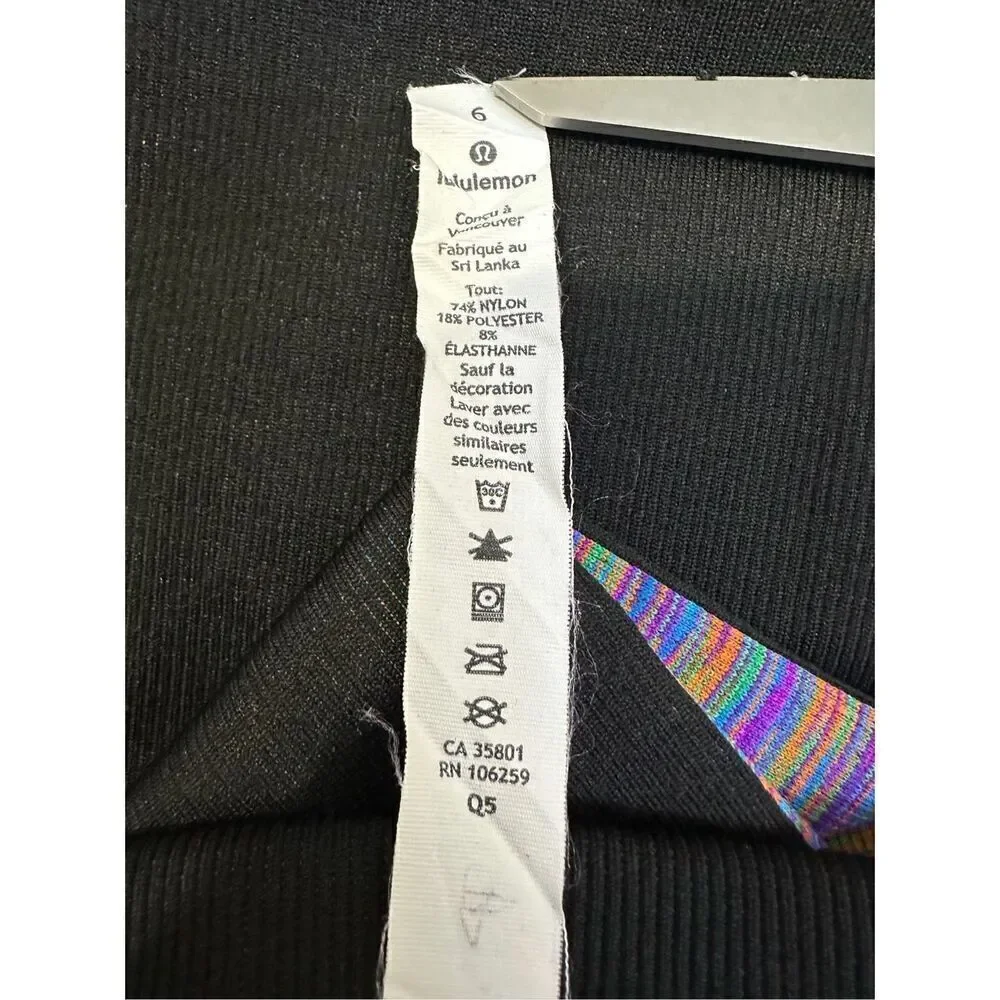 Lululemon women’s black leggings multicolor striping legs size 6/28. #16-1597